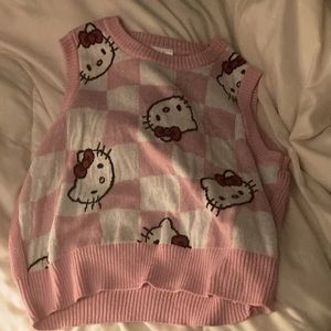 This hello kitty vest, this is a size medium, was never worn sells for $30